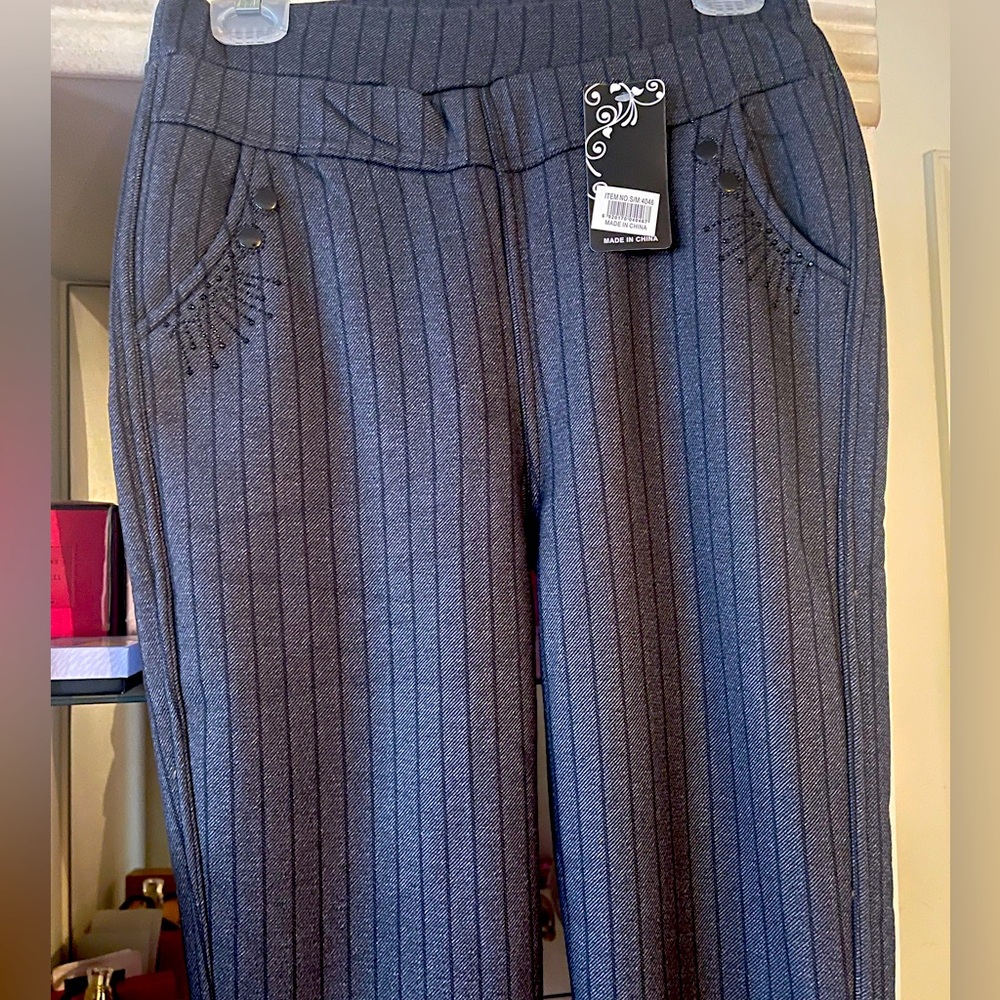 Woman’s dress pants lined with sequin detail fur lined